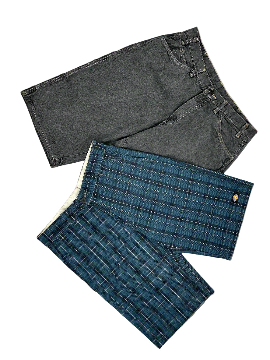 Two pairs of pants, one gray and one blue plaid, on a light gray background. Two pairs of pants, one gray and one blue plaid, on a light gray background.