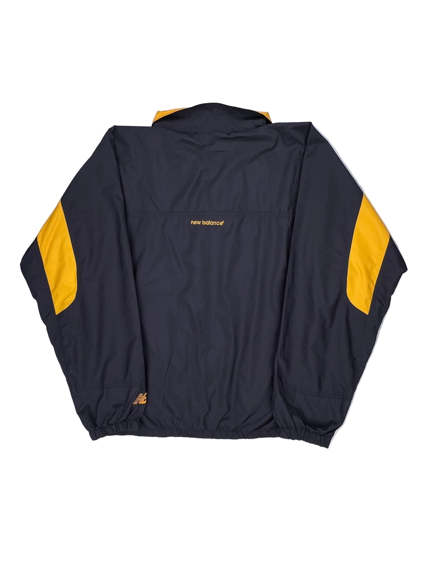Folded dark blue jacket with yellow accents on a light gray background Folded dark blue jacket with yellow accents on a light gray background