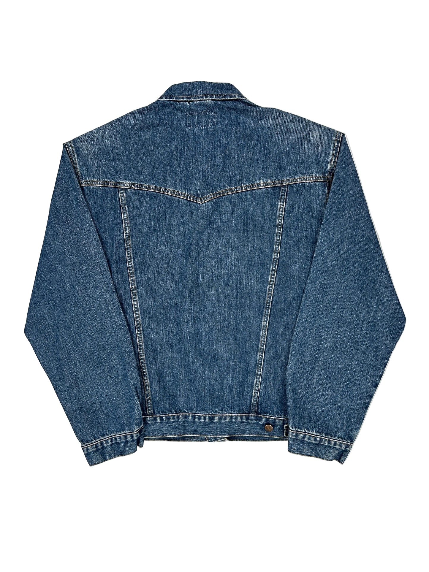 Folded blue denim jacket on a white background Folded blue denim jacket on a white background