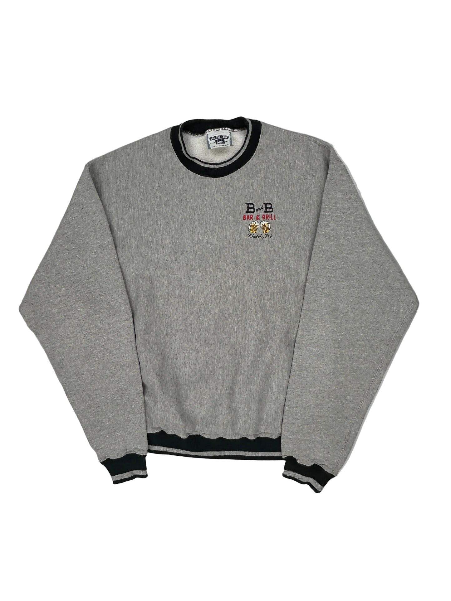 Gray tracksuit with a brand logo on a white background Gray tracksuit with a brand logo on a white background