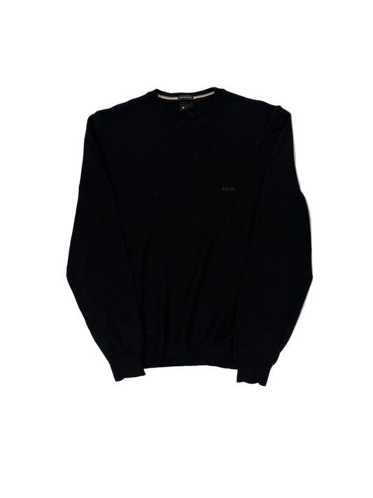 Black shirt on a white textured surface