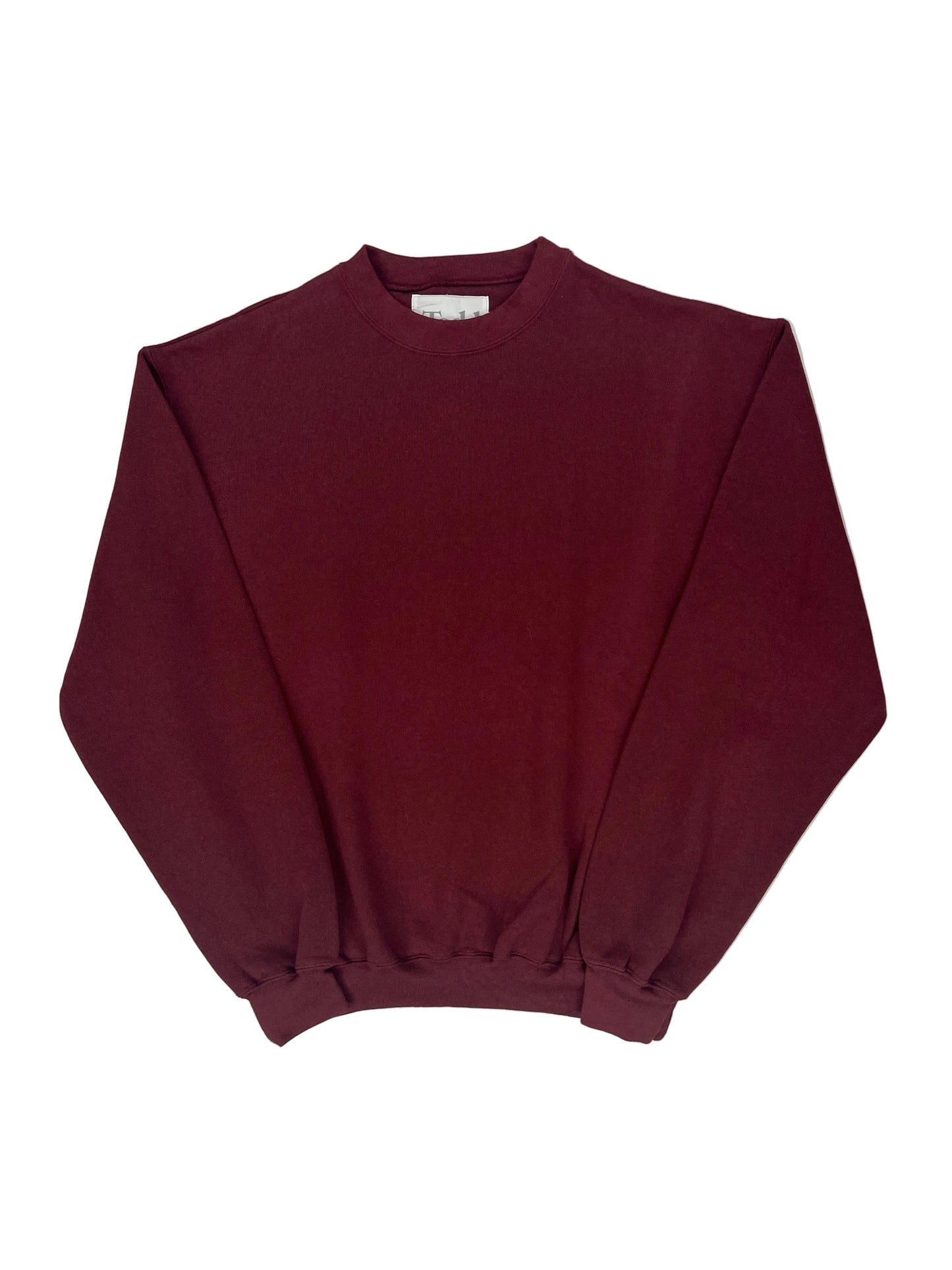 Maroon top on a white background