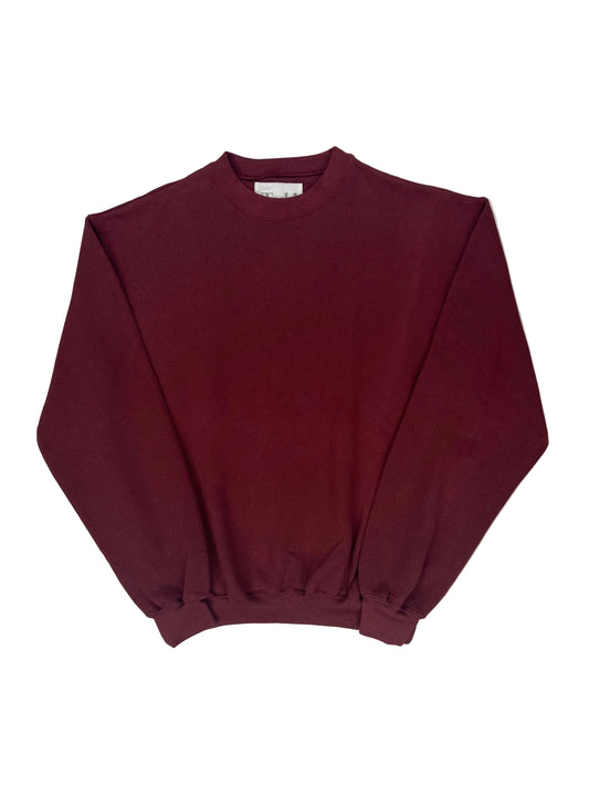 Maroon top on a white background