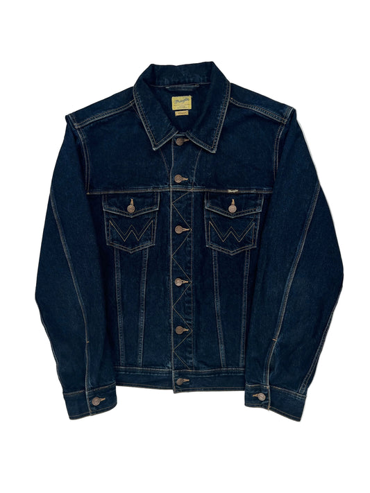 Folded dark blue denim jacket on a white background