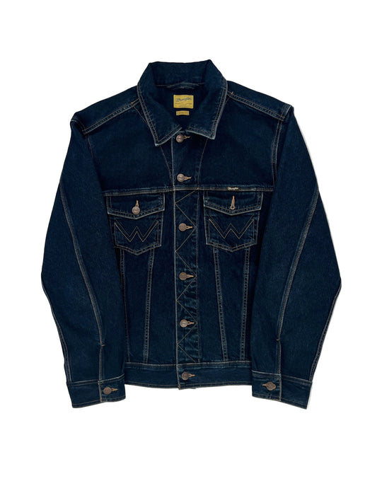 Folded pair of dark blue jeans on a white background