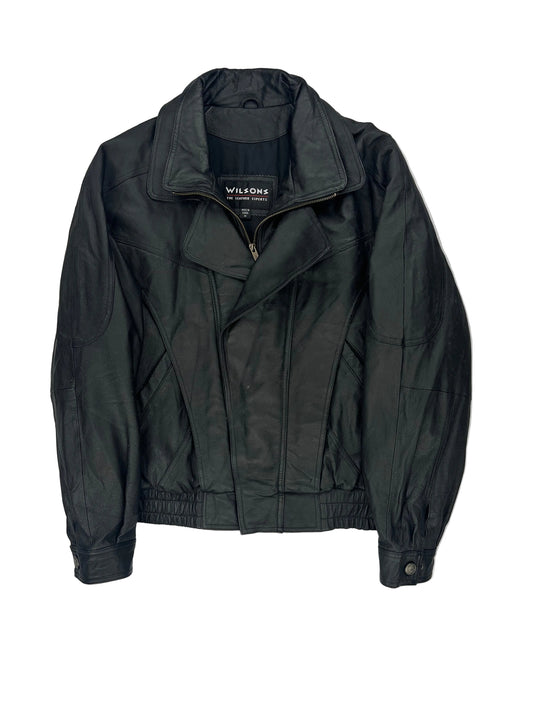 Folded black jacket on a white background