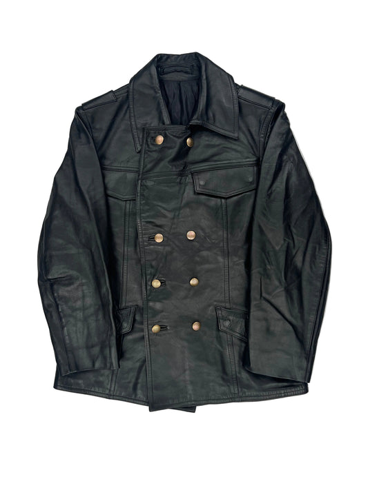 Folded black leather jacket on a white background