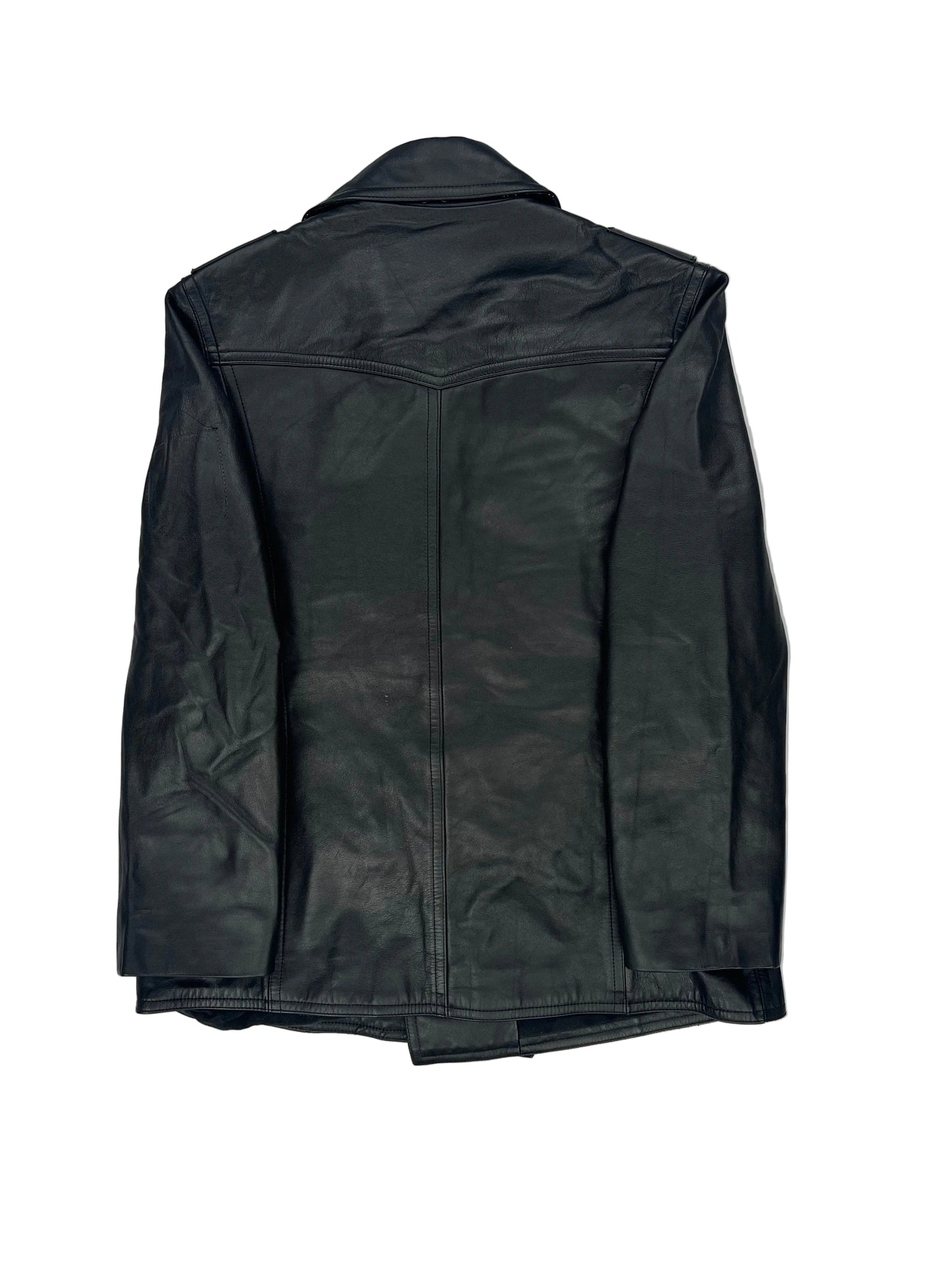 Folded black jacket on a light gray background