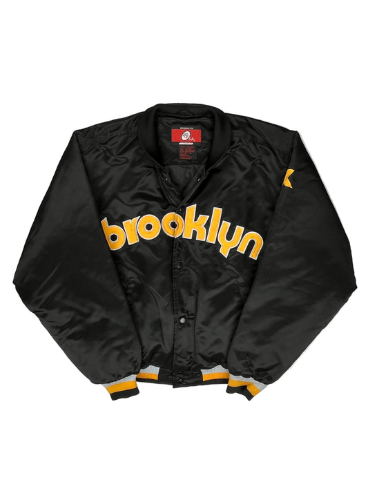 Black jacket with 'Brooklyn' text on a white background
