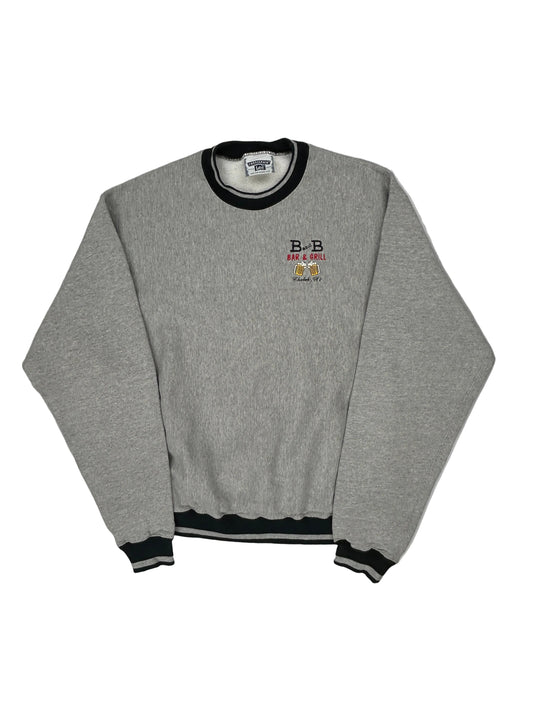 Gray tracksuit with a brand logo on a white background