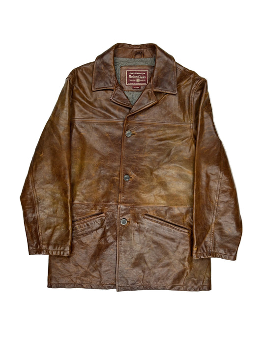 Brown leather jacket on a white background